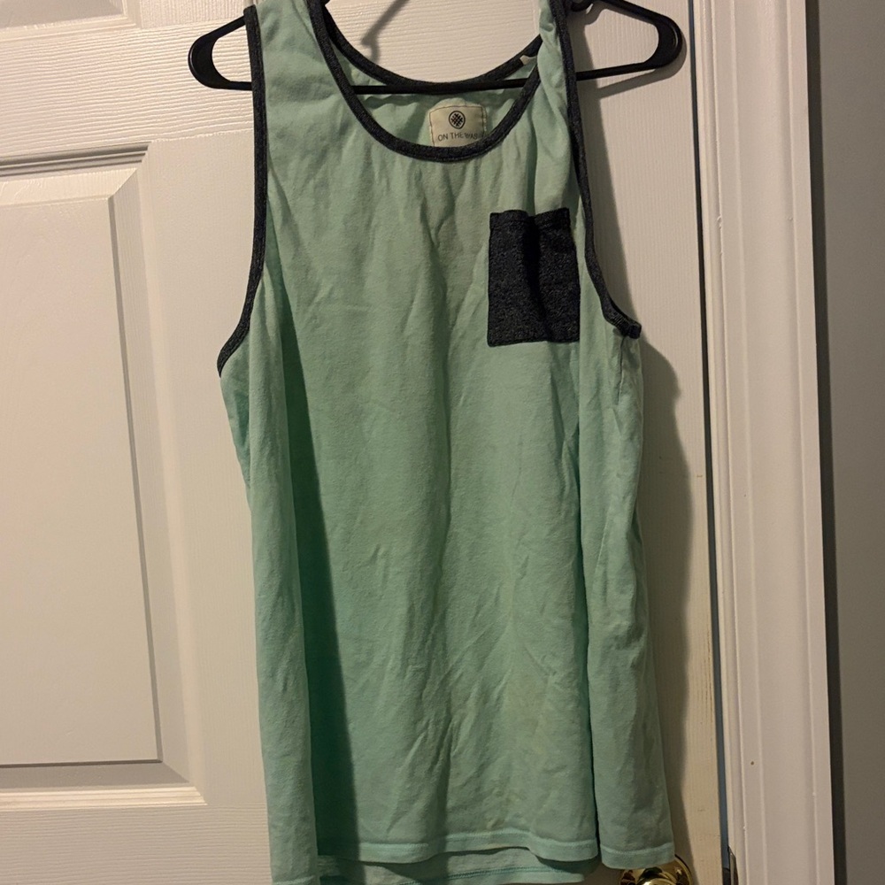 On the Byas Mint and Black Tank Top